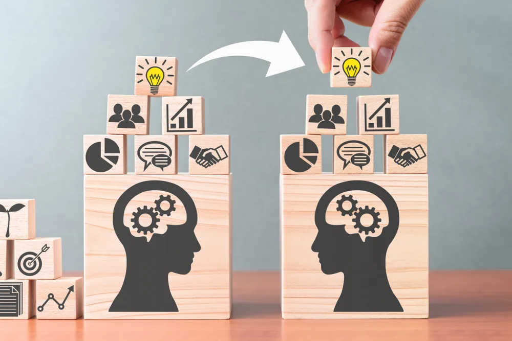 Knowledge,Transfer.,Business,Knowledge,Management.,Building,Wood,Blocks,On,Table.